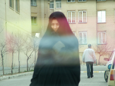 Woman in chador.