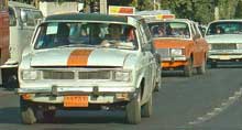 Iran Travel: information on getting around Iran by bus, train and airplane.